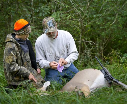 The Michigan Department of Natural Resources reminds hunters across the state that deer harvest reporting is once again required this hunting season.
