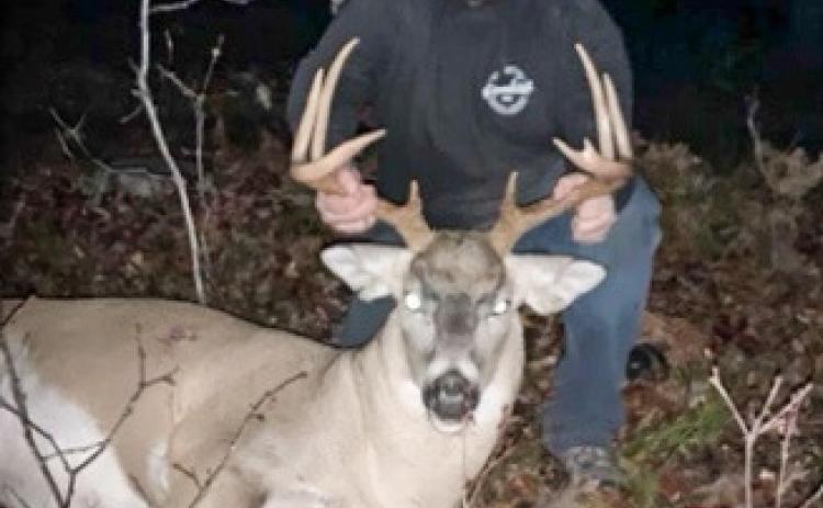 Nicolas Patnode, 19, of Kalkaska poses with an illegal 9-point deer he killed in 2022. Patnode and Zander Garrett face a combined 14 charges after torturing a porcupine and illegally hunting throughout the county during October-November 2022. Both Kalkaska men are due back in court on May 20.