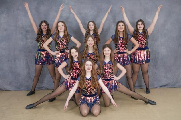 Intermediate jazz team received a diamond and first overall in their age group. Dancers pictured left to right: Karah Dee, Lily Hillier, Bella Hand, Ayla Donahue, Molly Lathrop, Rina Graveline, Brynley Brubaker, Ellie Celestino, and Samantha Edick.