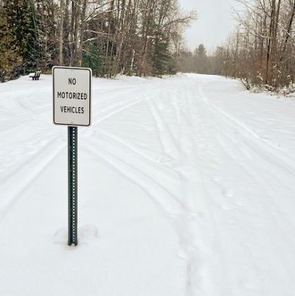 The sign that reads “No Motorized Vehicles” at the Trail of Two Cities Buckeye Trailhead on River Road.