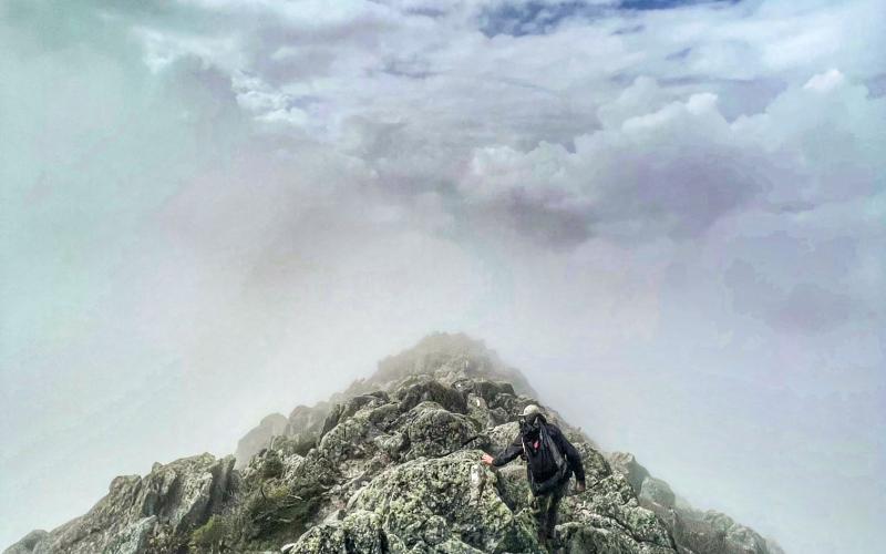 Loren McLaughlin is on the final leg of the Appalachian Trail hiking the Abol Trail to the summit of Mount Katahdin. Inset photo, famous Katahdin sign at summit.