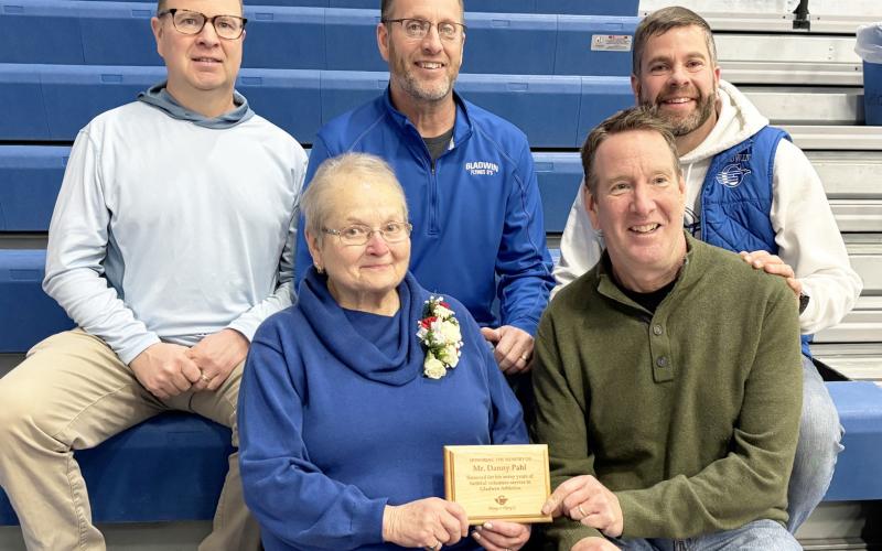 Family of the late Danny Pahl gathered during a ceremony honoring the long time supporter of Gladwin athletics.