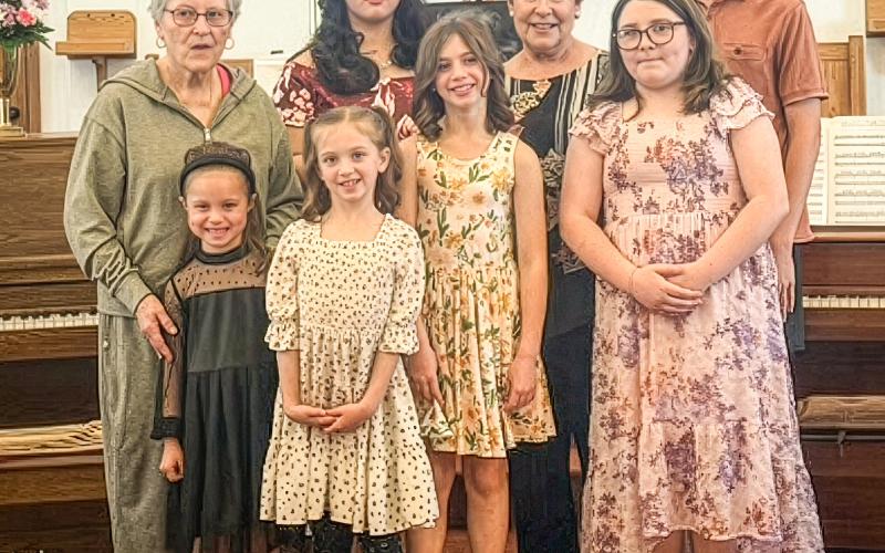 Pictured left to right: Ms. Sharon Hobin, Adalyn Sheets, Abigail Cummings, Aria Cummings, Kashia Hang, Ms. Sherrie Graham, Lily McLaren, and Koen Allen.