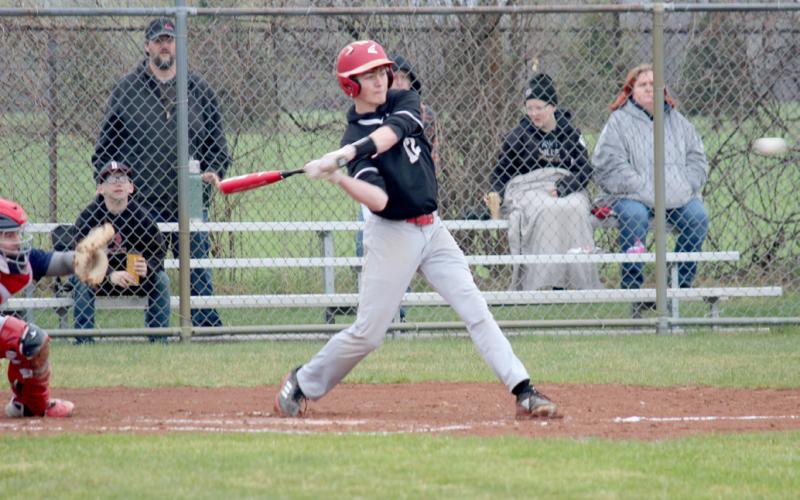 Reese Longstreth swings, looking to knock the ball for a base hit.