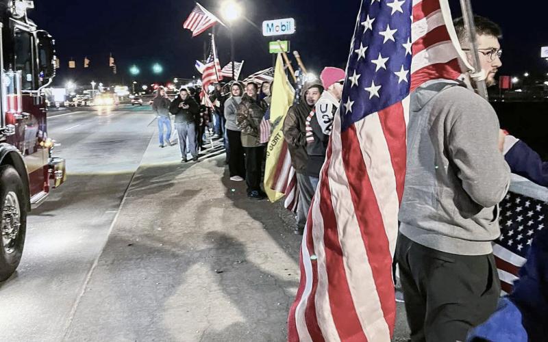 A crowd gathers at the Birch Run overpass along I-75 to show their support for the late Army Specialist Braden Peltier. PHOTO PROVIDED BY ALESIA SULLIVAN