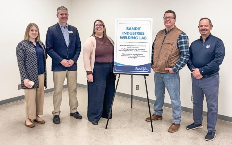 Pictured are Bandit Industry Reps standing alongside Mid Michigan College officials: Alexa Carey, Executive Director of the Mid Michigan College Foundation; Shawn Troy, Dean of Workforce &amp;amp; Career Education; Jody Thompson, Director of Human Resources; Corey Schafer, Director of Parts and Service; and Tim Hood, Mid Michigan College President.