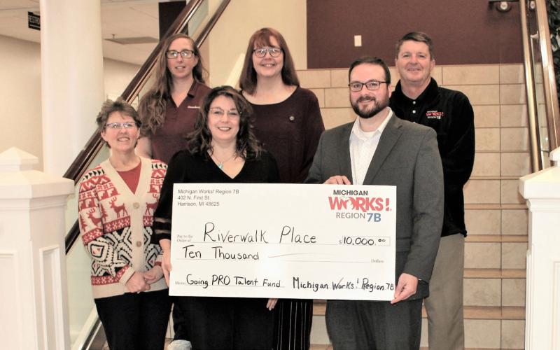 Pictured left to right are Pam O’Laughlin, Chief Operating Officer, Michigan Works! Region 7B; Rebecca Binger, Riverwalk Place; Stacy Plude, Riverwalk Place; Selena Ford, Riverwalk Place; ; Matt Lang, Director of Business Services and Economic Development, Michigan Works! Region 7B, Gladwin County; and Mark L. Berdan, Executive Director, Michigan Works! Region 7B.