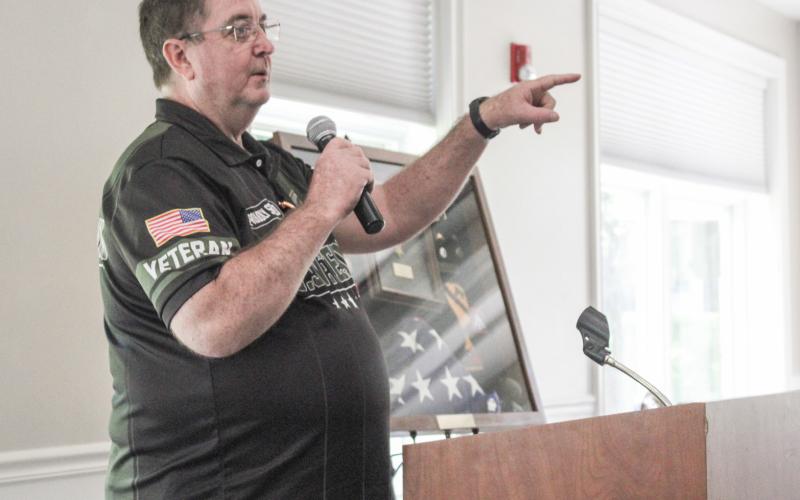 Gladwin County Office of Veterans Affairs Director Ken Roberts makes a point while addressing the gathering at Thursday’s dinner.