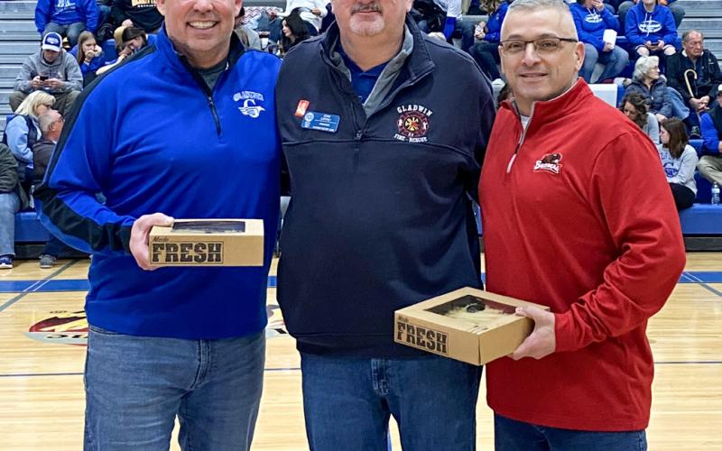 Pictured with Gladwin Rotary member, John Caffrey (center) is Rick Seebeck, Superintendent of Gladwin Schools (left), and Joe Passalacqua, Superintendent of Beaverton Schools (right).