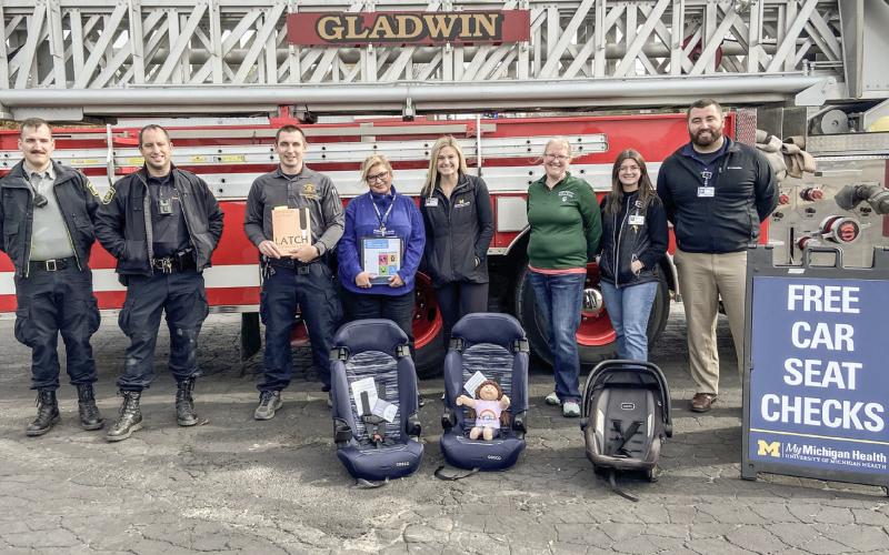 Staff at the Car Seat Check Event in Gladwin from left to right Brennan Snow, Shane Noble, Christopher Kustra, Kelli Jankens, Kelsey Killinger, Lindsay Walker, Sydney Zuke, Christian Church.