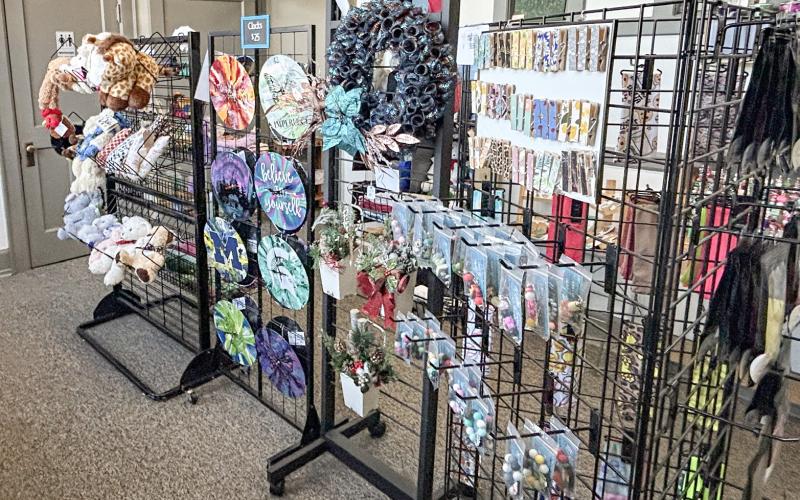 Peachy Keen Designs is located at 247 W. Cedar Ave. Suite 2. They held their grand opening on Nov. 9. Inset, Kristin Beebe, owner of Peachy Keen Designs.