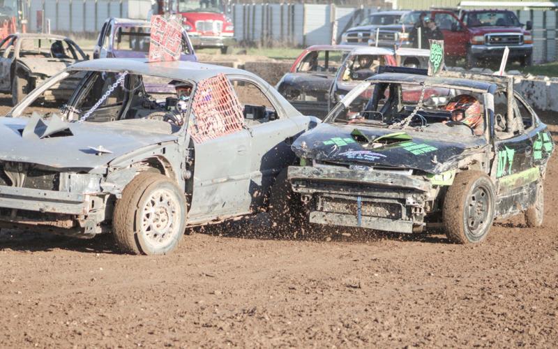 Beaverton’s Chris Thurlow pushes his way in from the outside during Bump &amp;amp; Run action Saturday at the Gladwin County Fairgrounds.