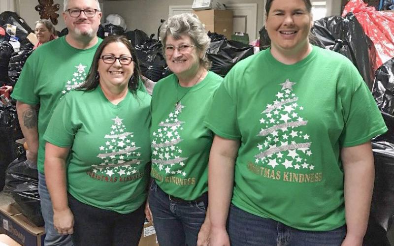 Pictured in 2023, Parking Lot Coordinator, Becky Kirkpatrick and helpers Joe, Jacob, Brian and Walt of the Mad Vikings Beard Club, Daniel and Frances, and Brian Breault. Inset photo, Adoption Team Coordinator, Karrie Mungin and helpers Matt Neal, Lori Molesworth, and Brittany Sheehan.