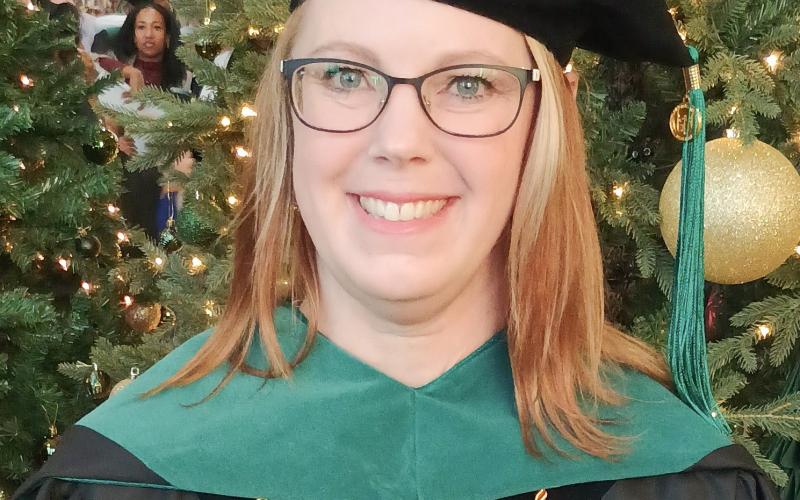 LUCKE RECEIVES PHD