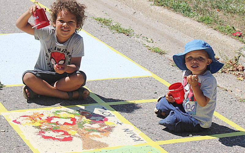 Kids Paint the Pavement near county courthouse