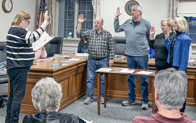 Gladwin City Council members Dave Crawford, John Caffery, Jamie Sischo, and Deb Platt were sworn in at the Gladwin City Council meeting on December 2.