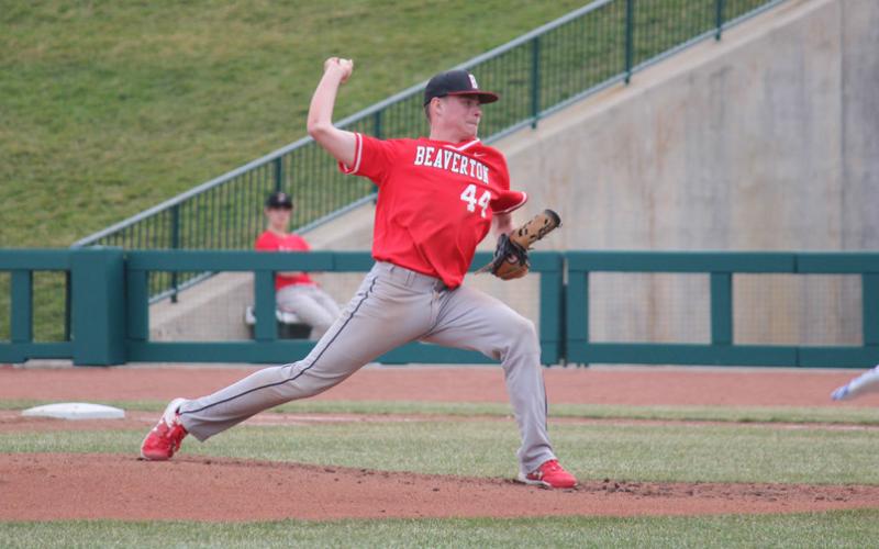 Beaverton’s Dakota Knake in motion as he delivers the pitch.