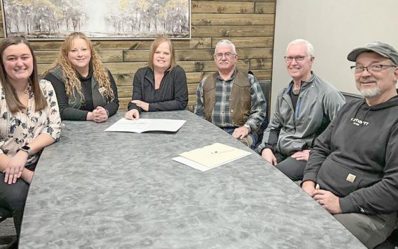 Pictured left to right: Carley Van Tiem of Superior Title, Gladwin Mayor Sarah Kile, City Clerk Marietta Andrist, and Skeels Christian School board members, Dave Cady, Mike Steinkraus, and Brent Hughey.