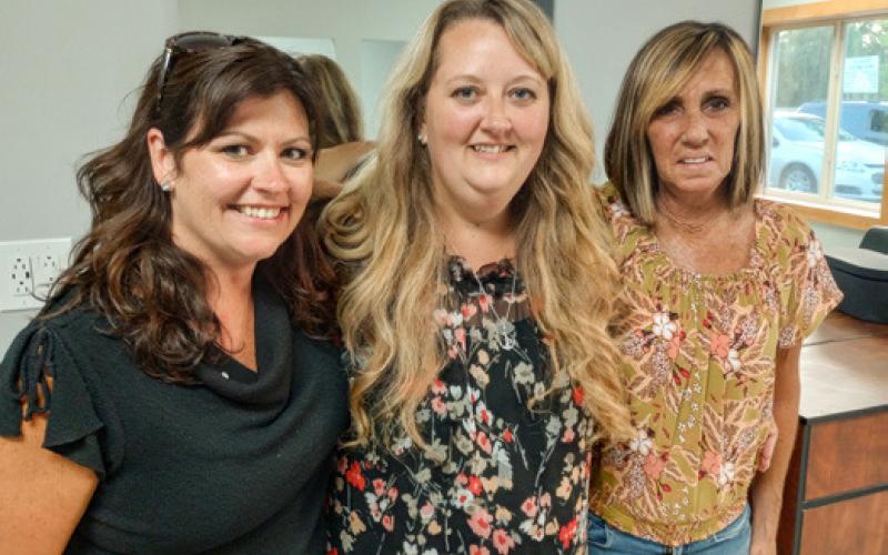 The Coffee Table Salon opened on August 10 and is located at 1557 W. M-61 in Gladwin. Inset photo, left to right, is Rebekah Winchester, Amanda Dare, Lisa Hamilton, the three hairdressers for The Coffee Table Salon.