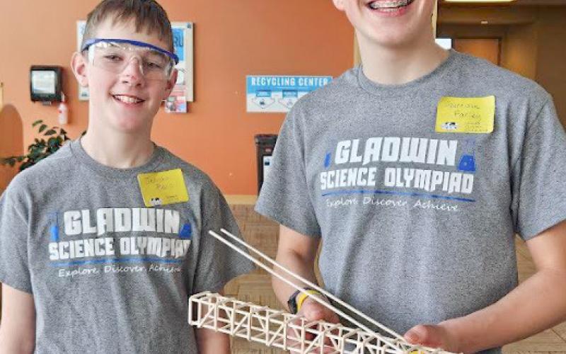 Pictured at left, Jace McKenna and Ivan Christensen with their Scrambler car. At right, Jericho Barz and Garrison Farley with the boomilever they built.