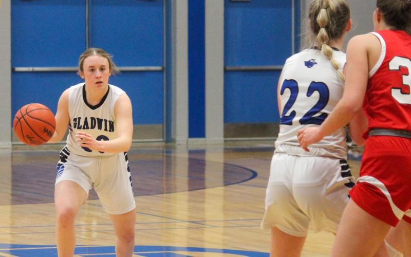 Maelyn Guzman looks to push the ball up court for Gladwin.