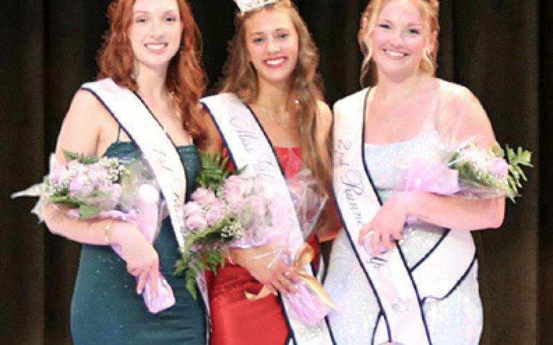 The Board of Directors of the Miss Gladwin County Scholarship Program, which included some past contest winners, gathered to crown this year’s winner at the Beaverton Activity Center Saturday night. The top three finishers were (inset left to right) Ava Nickel, Bree Visser and Brynn Beebe.