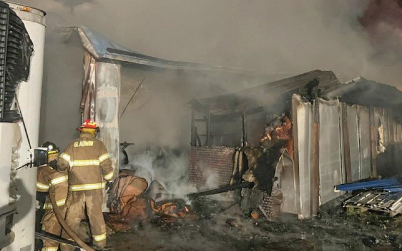 Early morning fire ravages Lambert’s Meat Market