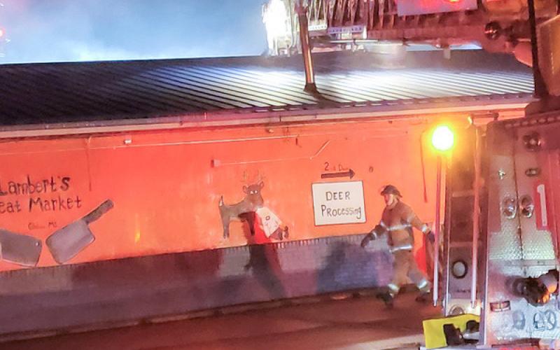 Firefighters contained the blaze at Lambert’s Meat Market on Wednesday, July 19.