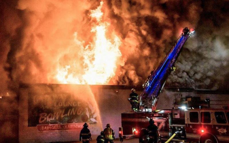 First responders attack the exterior flames of Gateway Lanes &amp;amp; Lounge. PHOTOS PROVIDED BY AARON STROUSE