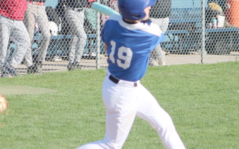 Gladwin’s Peyton Koshorek follows the flight of the ball during a game earlier this season.