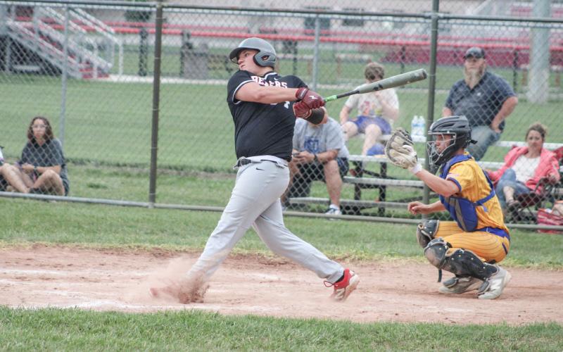 Beaverton’s Ben Zdrojewski rips a hit during last week’s doubleheader sweep of visiting Harrison.