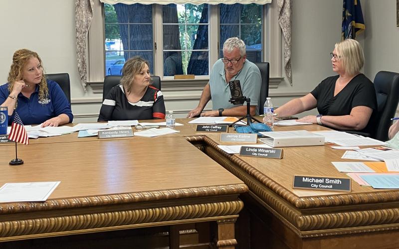 Gladwin City Council Member Jaimie Esiline makes a point while Mayor Sarah Kile, City Administrator Kimberly Hines and Council Members John Caffrey and Linda Winarski listen in during last Wednesday’s Special Meeting.