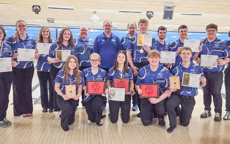 Gladwin’s bowlers pose with their prizes after a big year in the Jack Pine Conference ended Saturday at Riverwood Resort. In the front row (left to right) are: Payton Sanders, Ryleigh Sanders, Angelica Corlew, Jaden Willis, Hunter Davy. In the back row are: Madeline Crawford, Josie Pollock, Alexis Farrow, Brittany Crawford, Coach Crawford, Coach VanTiem, Coach Hager, Carson Hindman, Dylan Moore, Wade Roehrs, Riley Banfield, and Noah Raymond.