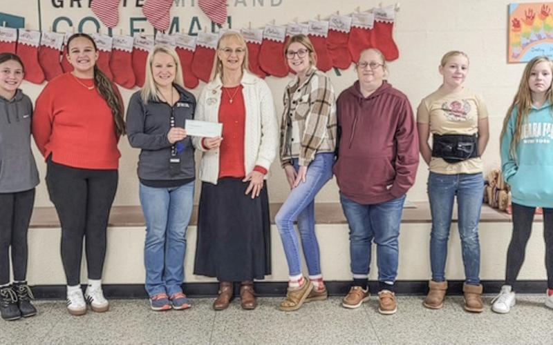 Pictured from left to right: Hadley Green, Mayela Cordova, Kari Wedge, Ann Sigsby, Ashlee Moore, Darci Cole, Heidi Cole, and Angelina Cole.