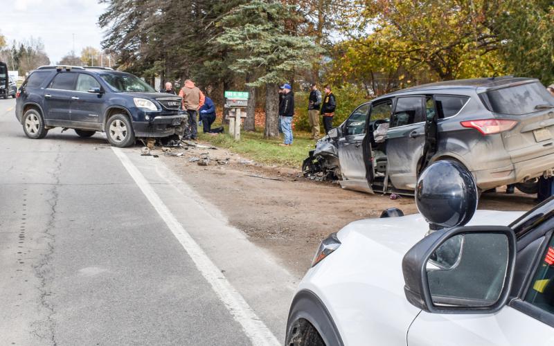 Responders assess damage after a head-on collision on M-18.