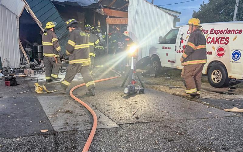 Pictured are first responders on scene at Clare Auto Service. PHOTO PROVIDED BY CLARE CITY POLICE