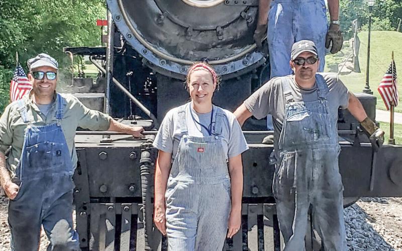 Heather Kaiser, her father Terry Bloom and her brothers run the Little River Railroad.