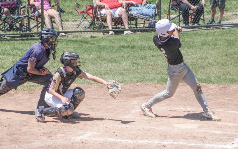 Sean Barta rips a hit during Beaverton’s Division 3 district semifinal victory over Farwell Friday.