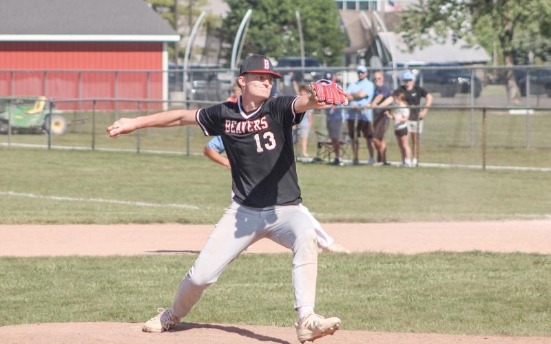 Beaverton’s Ian Roberts delivers a pitch during Friday’s Division 3 district tournament.