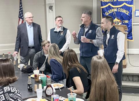 State Representative Mike Hoadley, flanked by State Senator Roger Hauck and State Representative Bill G. Schuette, talks shop with members of the Gladwin County Youth Leadership Program at Friday’s Legislative Breakfast.