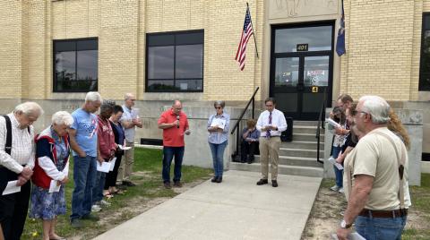 Pastor Joe Dorais officiates at a prayer gathering honoring America’s 250th birthday Sunday at the Gladwin County Courthouse.