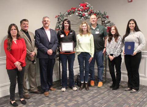 Pictured left to right are Michigan Works! Region 7B Area Manager Amber Davies; Michigan Works! Region 7B Executive Director Mark L. Berdan; State Representative Michael Hoadley; Alecia Vaughn with her parents Julie and Robert; Gladwin County Commissioner Karen Moore; and Constituent Relations Representative Ashley Elfawal, the Office of Congressman John Moolenaar.