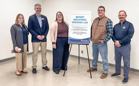 Pictured are Bandit Industry Reps standing alongside Mid Michigan College officials: Alexa Carey, Executive Director of the Mid Michigan College Foundation; Shawn Troy, Dean of Workforce &amp; Career Education; Jody Thompson, Director of Human Resources; Corey Schafer, Director of Parts and Service; and Tim Hood, Mid Michigan College President.