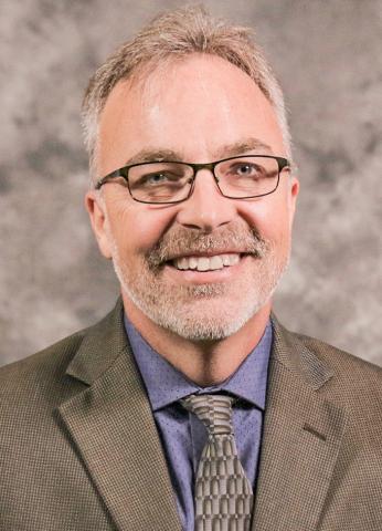Farm Bureau district director Jeff Sandborn grows 1,800 acres of corn, soybeans and wheat in Ionia County.