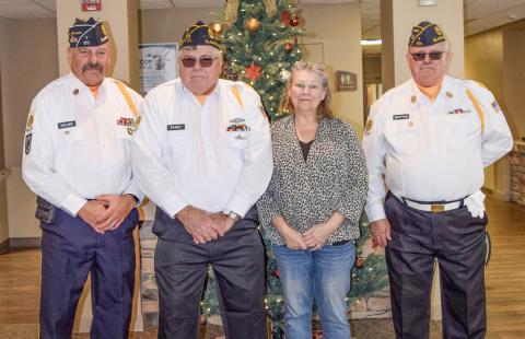 Pictured from left to right is American Legion Post 171 Commander Jim Volant, Service Officer Mike Perry, Cheryl Parmer from the West Branch Post, and Adjutant Dr. Rick Bratton.