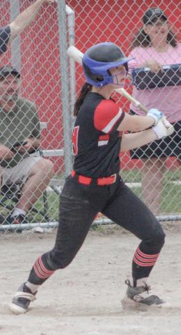Beaverton’s Emily McCann keeps a rally going with a single during last week’s doubleheader with Harrison.