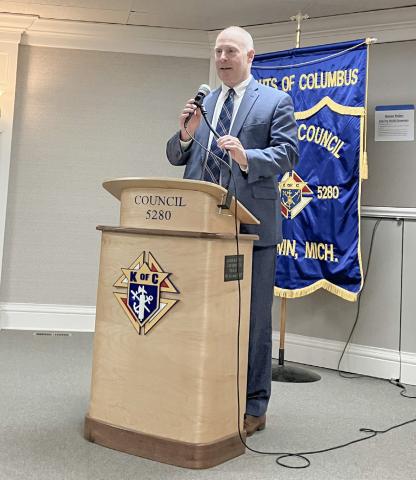 Congressman John Moolenaar addresses an occasionally feisty crowd at the Chamber of Commerce Legislative Breakfast Friday at the Knights of Columbus.