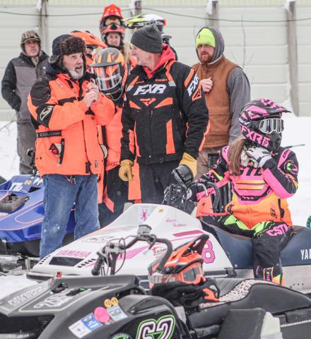 Engines rev as the next heat waits for the signal to head onto the track at the Vintage Snowmobile Race held Saturday at the Gladwin County Fairgrounds.