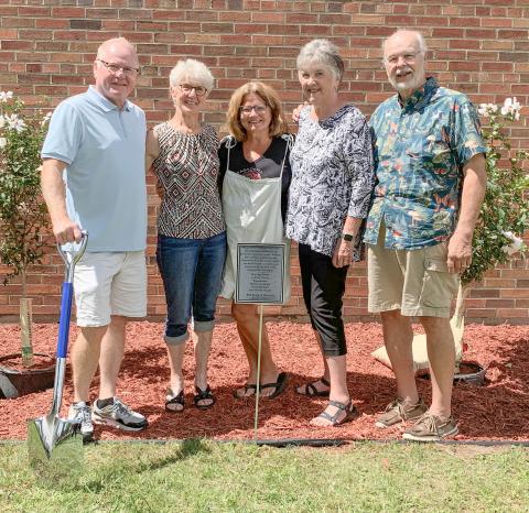 BAC leadership team honored with tree planting