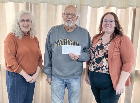On Monday, November 11, 2024, Tom Winarski (at center), from the Judge Shaffer Advised Fund, presented the CoA’s Executive Director, Lori Stout (at left), and Program Director, Anna McNeill (at right) with the grant check.
